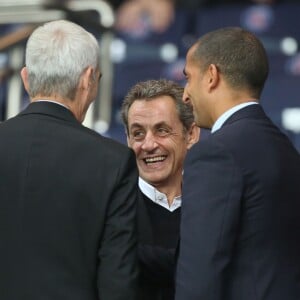 Jean-Claude Darmon, Raymond Domenech, Nicolas Sarkozy, guest - People assistent au match PSG-Barcelone de la Ligue des Champions 2014 au parc des princes à Paris le 30 septembre 2014. Le PSG à remporté le match sur le score de 3-2.