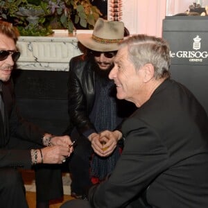 Exclusif - Johnny Hallyday, Don Was, Jean-Claude Darmon - Inauguration du Show Room Parisien De Grisogono et lancement de la montre "Crazy Skull" à Paris le 23 octobre 2014.