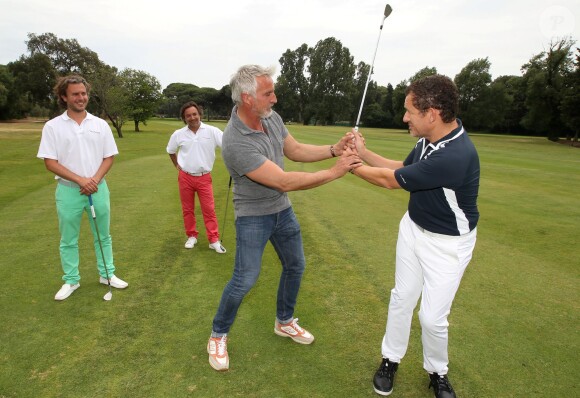 David Ginola et Dany Boon complices lors de la 4e édition de la Mapauto Golf Cup à Mandelieu-la-Napoule, le 12 juin 2015.