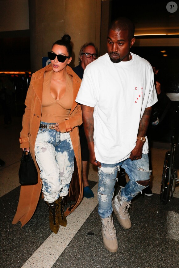 Kim Kardashian et Kanye West à l'aéroport LAX de Los Angeles, le 19 mai 2016.