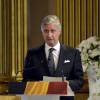 Le roi Philippe de Belgique lors de son allocution le 22 mai 2016 au palais royal à Bruxelles au cours d'une cérémonie d'hommage aux victimes des attentats terroristes perpétrés le 22 mars 2016.