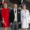 Le prince Frederik de Danemark entouré de la reine Maxima des Pays-Bas et de la princesse Madeleine de Suède au baptême de la princesse Estelle de Suède à Stockholm le 22 mai 2012