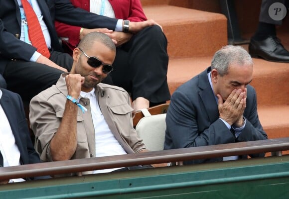 Tony Parker et Jean Gachassin dans les tribunes de Roland Garros le 26 mai 2016. © Dominique Jacovides / Bestimage