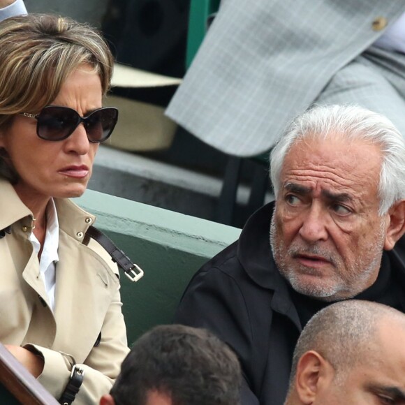 Dominique Strauss Kahn et sa compagne Myriam L'Aouffir dans les tribunes de la finale homme des internationaux de France de Roland-Garros à Paris le 5 juin 2016. © Moreau-Jacovides / Bestimage