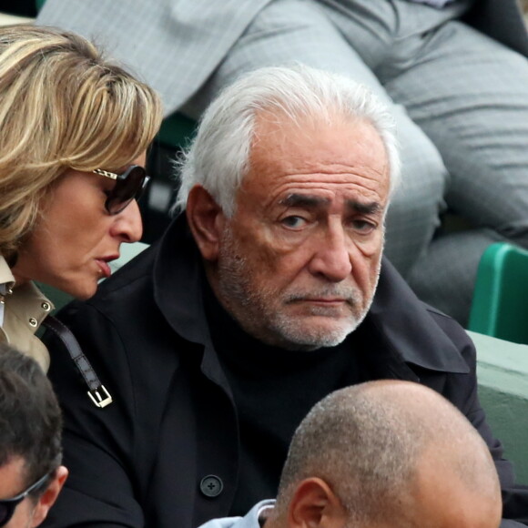 Dominique Strauss Kahn et sa compagne Myriam L'Aouffir dans les tribunes de la finale homme des internationaux de France de Roland-Garros à Paris le 5 juin 2016. © Moreau-Jacovides / Bestimage