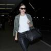 Miranda Kerr arrive à l'aéroport de LAX à Los Angeles, le 25 mai 2016
