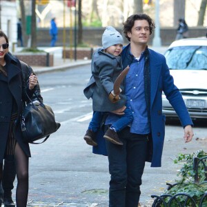 Miranda Kerr et Orlando Bloom reunis pour leur fils Flynn a New York, le 30 novembre 2013.