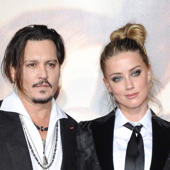 Johnny Depp et sa femme Amber Heard à la Première de "The Danish Girl" au Théatre Westwood Village à Los Angeles le 21 novemnre 2015. © CPA/Bestimage