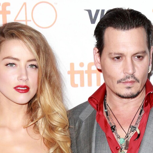 Amber Heard et son mari Johnny Depp à l' Avant-première du film "Black Mass" lors du Festival International du film de Toronto, le 14 septembre 2015.