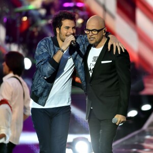 Exclusif - Amir, à gauche, et Pascal Obispo lors de l'émission de télévision pour TF1 "La Chanson de l'Année 2016" à Nîmes le 17 juin 2016. © Bruno Bebert / Bestimage