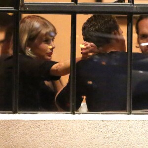 Singer, Taylor Swift, and her British hunk, Tom Hiddleston, spotted out on another double date in Nashville, TN, USA. The couple seemed to be having a great time as they chatted with friends and drank some wine. Tom Hiddleston looked like a proper English gent when he was seen kissing Taylor's hand as a token of his affection. She was seen in a black turtleneck, black shorts, Louis Vuitton handbag, and flats, on June 23, 2016. Photo by GSI/ABACAPRESS.COM24/06/2016 - Nashville