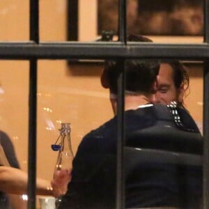 Singer, Taylor Swift, and her British hunk, Tom Hiddleston, spotted out on another double date in Nashville, TN, USA. The couple seemed to be having a great time as they chatted with friends and drank some wine. Tom Hiddleston looked like a proper English gent when he was seen kissing Taylor's hand as a token of his affection. She was seen in a black turtleneck, black shorts, Louis Vuitton handbag, and flats, on June 23, 2016. Photo by GSI/ABACAPRESS.COM24/06/2016 - Nashville