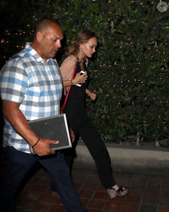Johnny Depp et ses enfants Lily-Rose et Jack John Christopher, sortant du restaurant Ago à Los Angeles le 29 juin 2016