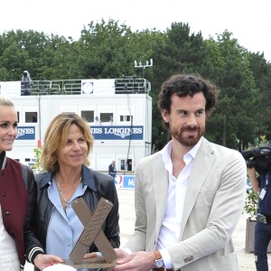 Laeticia Hallyday, Mathias Vicherat et son fils, Virginie Coupérie-Eiffel - Remise du prix Eiffel Sunday Challenge présenté par la Mairie de Paris lors du Longines Paris Eiffel Jumping à la plaine de Jeux de Bagatelle à Paris, le 3 juillet 2016. © Pierre Perusseau/Bestimage