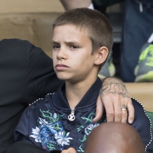 David Beckham et ses enfants Romeo et Cruz dans les tribunes du tournoi de Wimbledon le 6 juillet 2016.