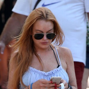 Semi-exclusif - indsay Lohan en vacances avec des amis sur un yacht en Sardaigne, après sa rupture avec Egor Tarabasov en Italie, le 26 juillet 2016