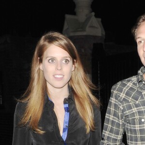 La princesse Beatrice d'York et son petit ami Dave Clark sortent du restaurant Chiltern Firehouse à Londres, le 9 avril 2014. Le couple s'est séparé à l'été 2016 après dix ans de relation.