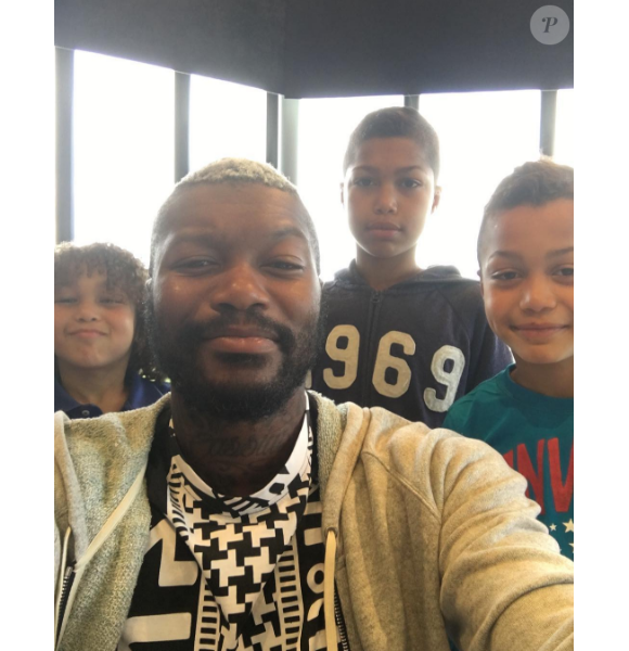 Photo de Djibril Cissé et ses trois garçons Cassius, Prince et Marley publiée le 14 août 2016.