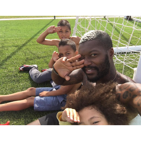 Photo de Djibril Cissé et ses trois garçons publiée le 16 août 2016.