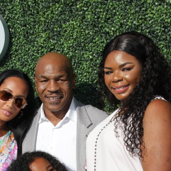 Mike Tyson, sa fille Gena, sa femme Lakiha Spiker et leur fille Milan lors de la cérémonie d'ouverture de l'US Open 2016 au USTA Billie Jean King National Tennis Center à Flushing Meadow, New York City, New York, Etats-Unis, le 29 août 2016. © John Barrett/Globe Photos/ZUMA Wire/Bestimage29/08/2016 - New York