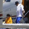Kylie Jenner et son compagnon Tyga arrivent en Californie en provenance des Îles Turques-et-Caïques où elle a fêté ses 19 ans avec des amis le 13 août 2016.
