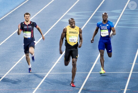 Christophe Lemaitre, Usain Bolt, LaShawn Merritt participent à la finale du 200 mètres hommes au stade olympique à Rio, le 18 août 2016.