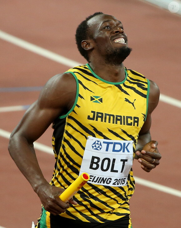 Usain Bolt - Les jamaïcains deviennent champions du monde en remportant le relais 4x100 lors du championnats du monde d'athlétisme à Pékin, le 29 août 2015.