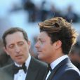 Kev Adams et Gad Elmaleh - Arrivées à la montée des marches du film "Elle" lors du 69e Festival International du Film de Cannes. Le 21 mai 2016.