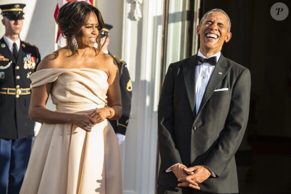 Le président américain Barak Obama et sa femme Michelle Obama lors du dîner du sommet des chefs d'Etat de cinq pays nordiques à Washington, le 14 mai 2016