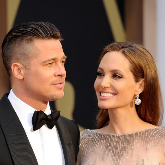 Brad Pitt et Angelina Jolie - Pressroom - 86ème cérémonie des Oscars à Hollywood, le 2 mars 2014.