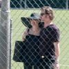 Exclusif - Brad Pitt et Angelina Jolie, très amoureux, assistent au match de football de leurs filles Shiloh (qui se fait désormais appeler John) et Zahara à Los Angeles, le 14 mars 2015