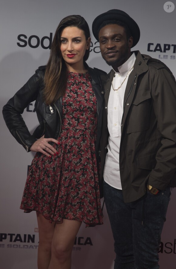 Corneille et sa femme Sofia de Medeiros à l'avant-première du film "Captain America" au Grand Rex à Paris, le 17 mars 2014.