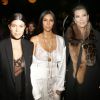 Kourtney Kardashian, Kim Kardashian et leur mère Kris Jenner au défilé de mode "Givenchy", collection prêt-à-porter Printemps-Eté 2017 lors de la Fashion Week de Paris, France, le 2 October 2016.