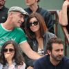 Info - Jean-Marc Barr est papa d'un petit Jude - Jean-Marc Barr et sa compagne Stella - People aux Internationaux de France de tennis de Roland Garros à Paris, le 1er juin 2014.