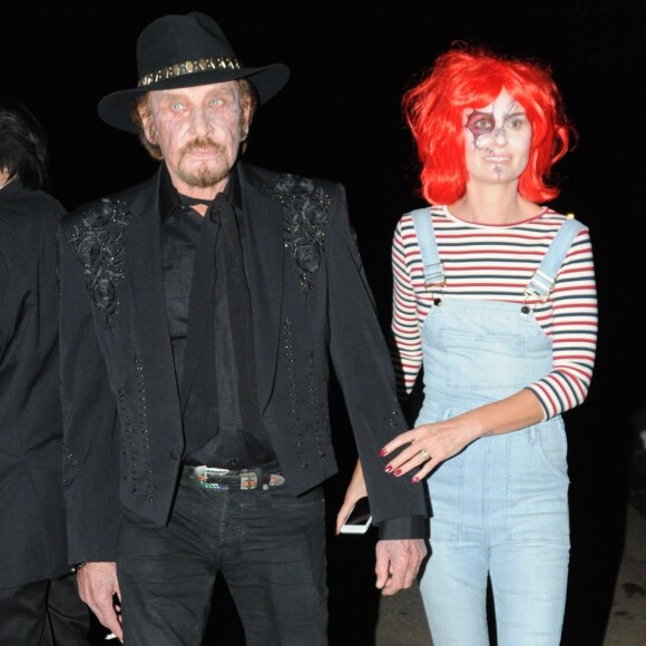 Johnny Hallyday et sa femme Laeticia Hallyday arrivent à la fête d'Halloween de Kate Hudson à Los Angeles, le 28 octobre 2016