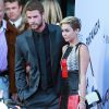 Miley Cyrus et son fiance Liam Hemsworth, ensemble pour la première fois sur un tapis rouge depuis un an, a la première du film "Paranoia" a Los Angeles, le 8 aout 2013
