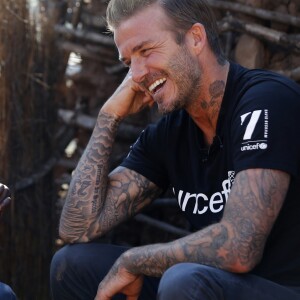 David Beckham, ambassadeur de bonne volonté de l'UNICEF rend visite à des enfants séropositifs en Afrique du Sud le 7 juin 2016.