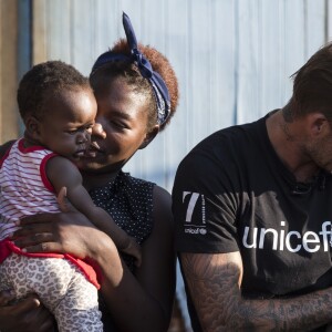 David Beckham, ambassadeur de bonne volonté de l'UNICEF rend visite à des enfants séropositifs en Afrique du Sud le 7 juin 2016.