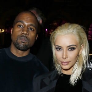 Kanye West et sa femme Kim Kardashian (blonde) - People au défilé de mode "Balmain" prêt-à-porter Automne-Hiver 2015-2016 au Grand Hôtel à Paris, le 5 mars 2015.