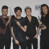 Liam Payne, Louis Tomlinson, Niall Horan, Harry Styles du groupe One Direction lors de la 43ème cérémonie annuelle des "American Music Awards" à Los Angeles, le 22 novembre 2015