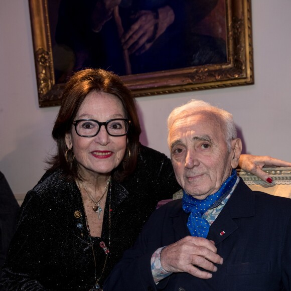 Nana Mouskouri et Charles Aznavour  à la Cérémonie de remise du prix Nikos Gatsos 2016, attribué à Charles Aznavour à l'ambassade de Grèce à Paris le 19 décembre 2016. © Cyril Moreau/Bestimage