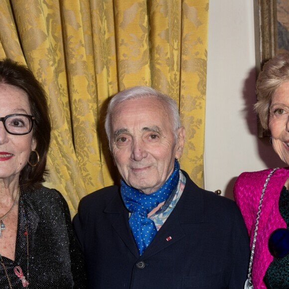 Charles Aznavour, Nana Mouskouri et Hélène Carrère d'Encausse à la Cérémonie de remise du prix Nikos Gatsos 2016, attribué à Charles Aznavour à l'ambassade de Grèce à Paris le 19 décembre 2016. © Cyril Moreau/Bestimage