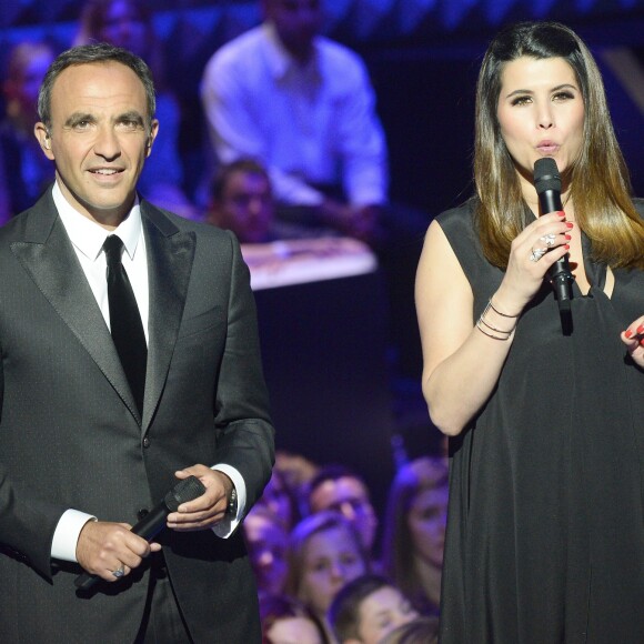 Nikos Aliagas et Karine Ferri - Plateau de la finale de l'émission "The Voice" à Paris. Le 14 mai 2016.