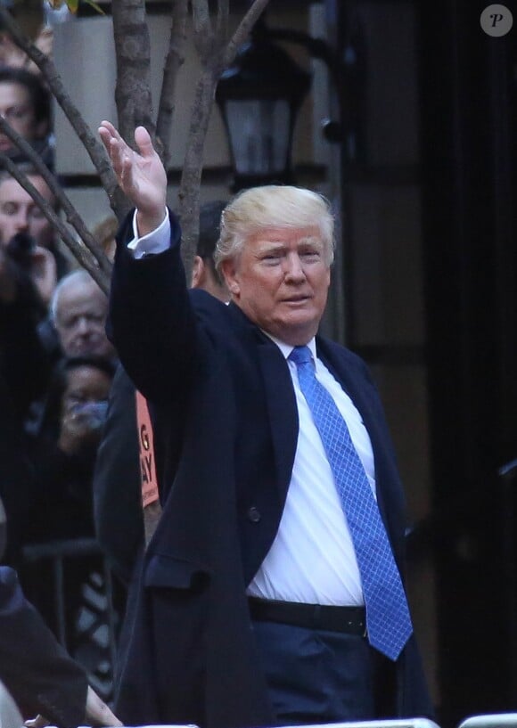 Le candidat du parti Républicain Donald Trump et sa femme Melania Trump vont voter pour les élections présidentielles américaines dans une école publique 59 du quartier de Manhattan à New York, le 8 novembre 2016.