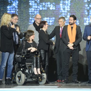 Gad Elmaleh, Sophie Davant , Nagui, Garou et Cyril Hanouna - 28e Téléthon au Champ de Mars à Paris le 6 décembre 2014.