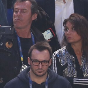 Jean-Luc Reichmann et sa femme Nathalie lors du match d'ouverture du Mondial de handball 2017, France-Brésil (31-16), à l'AccorHotels Arena à Paris le 11 janvier 2017. © Cyril Moreau/Bestimage
