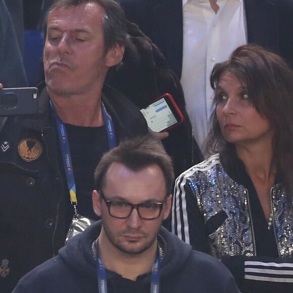 Jean-Luc Reichmann et sa femme Nathalie lors du match d'ouverture du Mondial de handball 2017, France-Brésil (31-16), à l'AccorHotels Arena à Paris le 11 janvier 2017. © Cyril Moreau/Bestimage