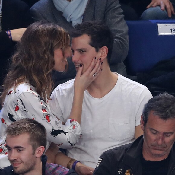 Laury Thilleman, son compagnon Juan Arbelaez et, devant eux, Jean-Luc Reichmann lors du match d'ouverture du Mondial de handball 2017, France-Brésil (31-16), à l'AccorHotels Arena à Paris le 11 janvier 2017. © Cyril Moreau/Bestimage