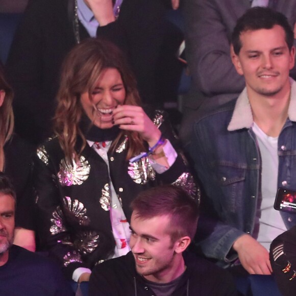 Laury Thilleman, son compagnon Juan Arbelaez et Jean-Luc Reichmann dans l'ambiance lors du match d'ouverture du Mondial de handball 2017, France-Brésil (31-16), à l'AccorHotels Arena à Paris le 11 janvier 2017. © Cyril Moreau/Bestimage