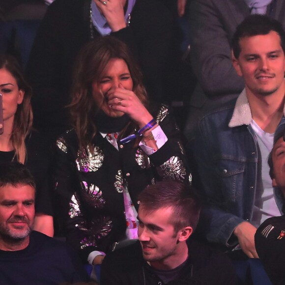 Laury Thilleman, son compagnon Juan Arbelaez et Jean-Luc Reichmann dans l'ambiance lors du match d'ouverture du Mondial de handball 2017, France-Brésil (31-16), à l'AccorHotels Arena à Paris le 11 janvier 2017. © Cyril Moreau/Bestimage